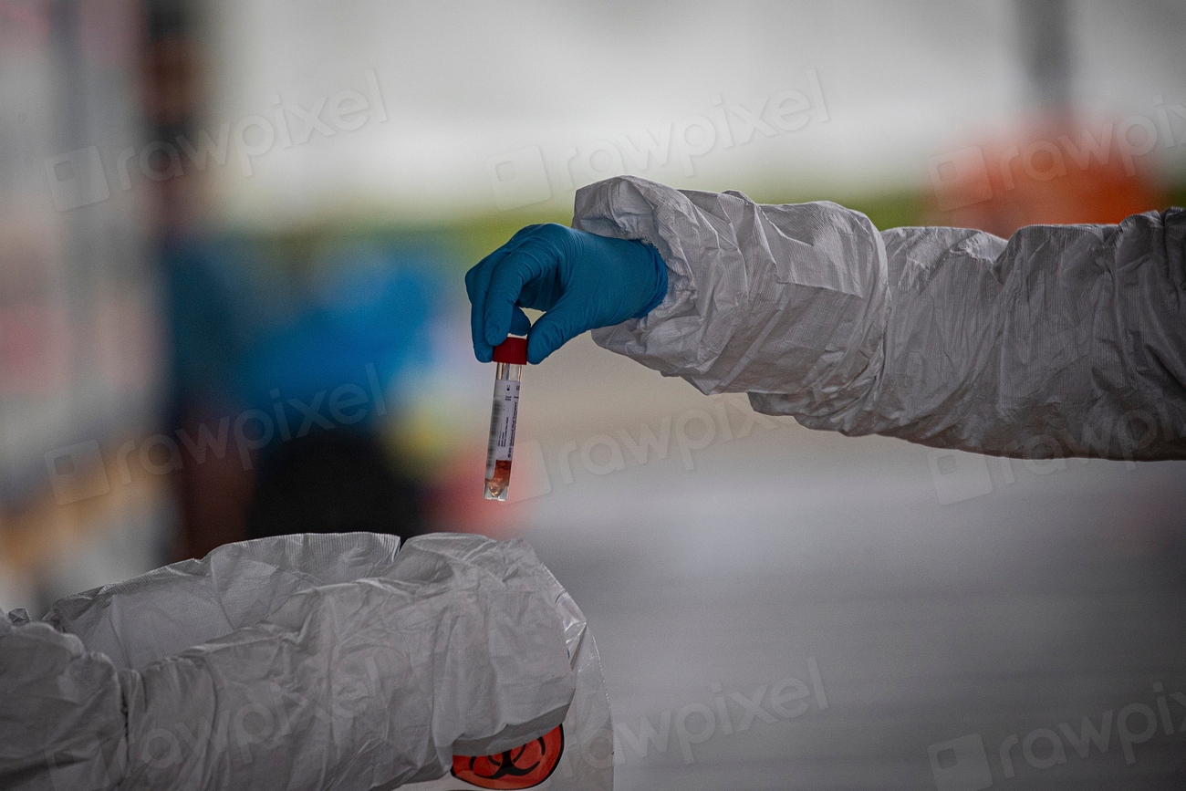 Medical staff collect samples from a patient. monkeypox