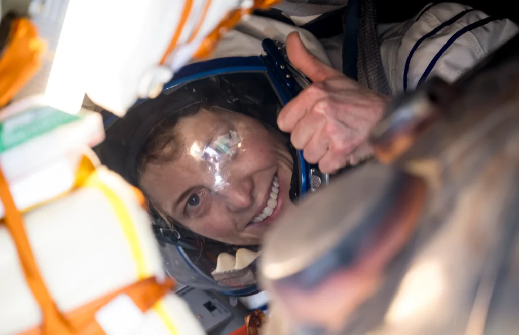 "Astronaut Loral O'Hara and crewmates safely return from the International Space Station, contributing to space exploration"