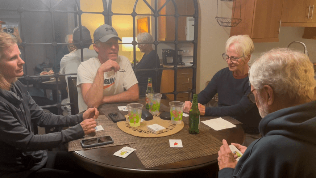 A group of people playing Pickle Everything, a word association game for pickleball enthusiasts.