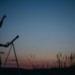 man with telescope watching sky. Comet 13P Olbers