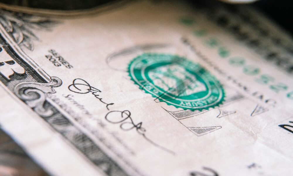 one us dollar banknote on table. Inflation