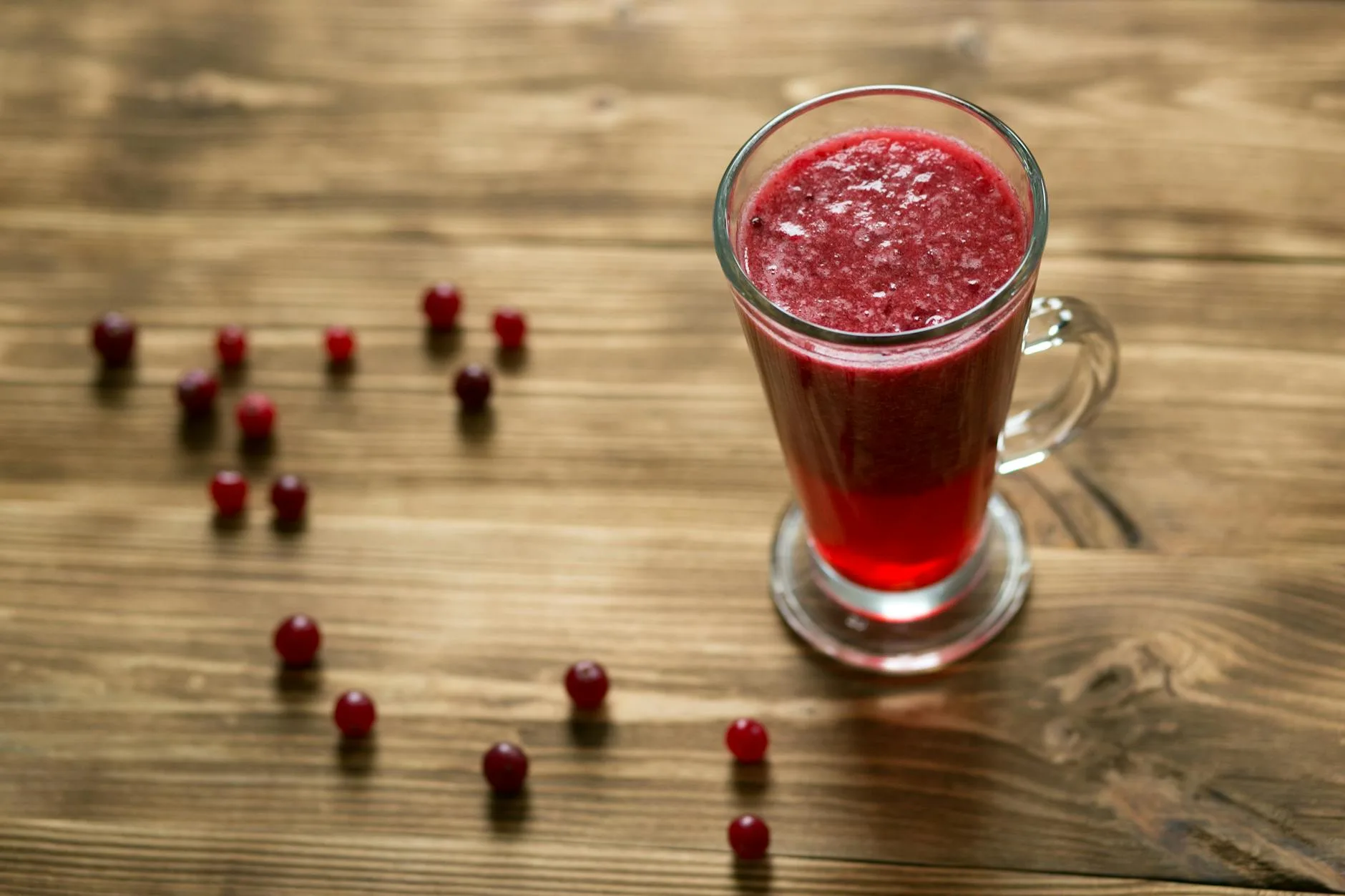 clear drinking glass with red juice. Mean Girls x Ocean Spray® Ocean Spray® Zero Sugar Cranberry and Mixed Berry Juice Drinks