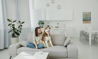 woman with dog in living room
