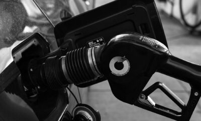 gas pump nozzle in the cars filler neck