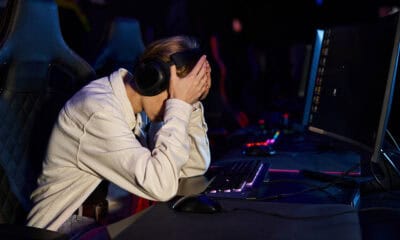 frustrated gamer at computer in dark room 2026 01 06 00 19 34 utc