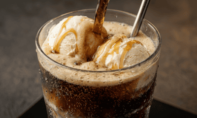 Firefly Gemini Flash Dessert soda concept Ice Cream Float Photorealistic close up of a fizzy dark soda 862793